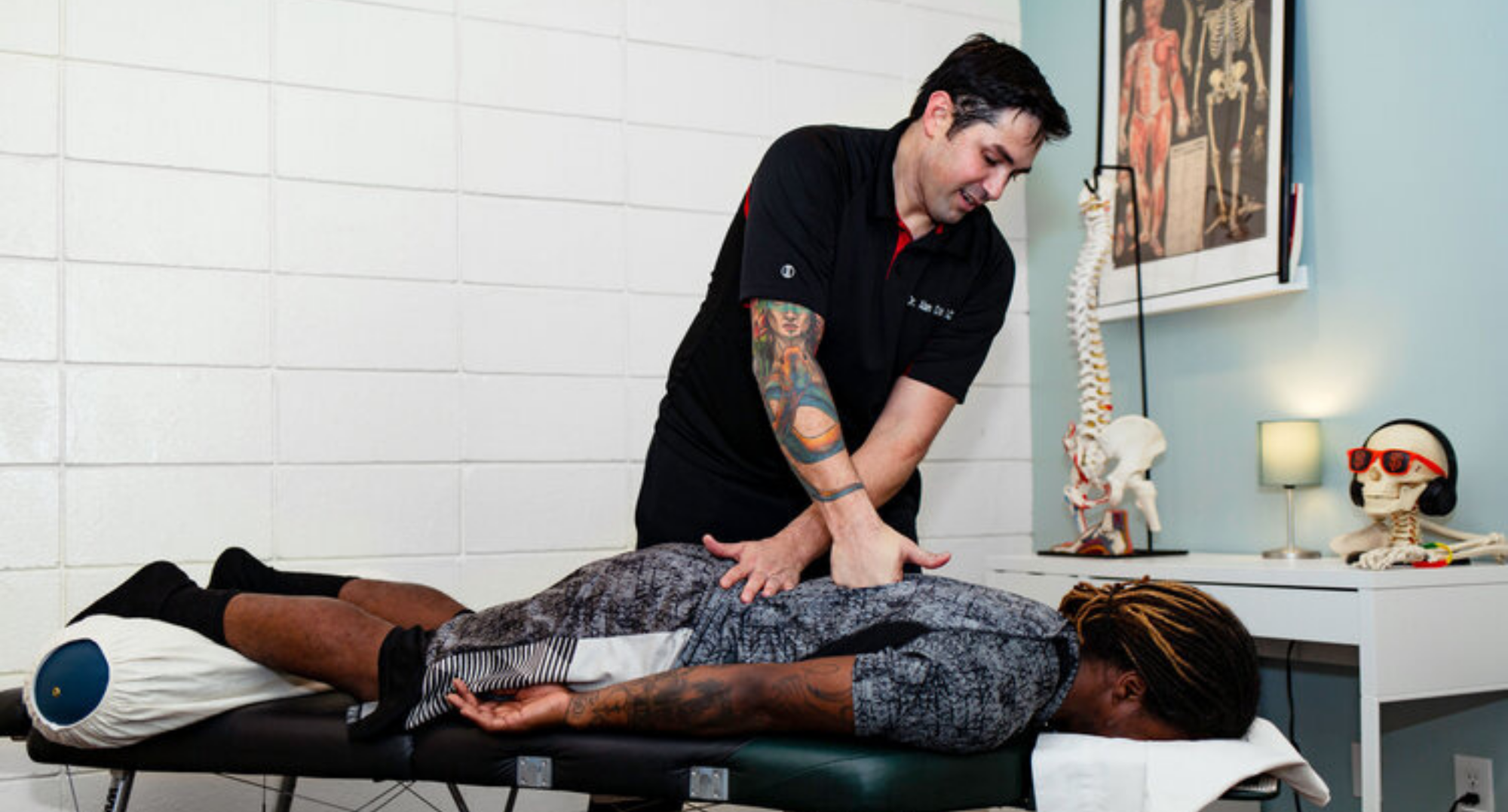 Dr. Alan providing a chiropractic adjustment