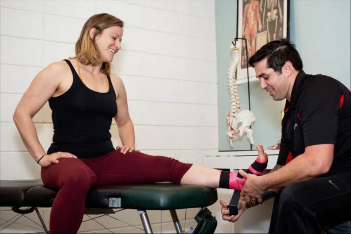 Dr. Alan working with a patient during a private chiropractic visit